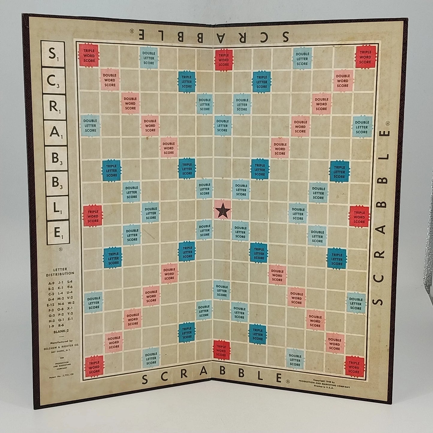 Vintage 1948 Scrabble game board with maroon back