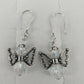 Silver tone angel wing dangle earrings with clear faceted beads