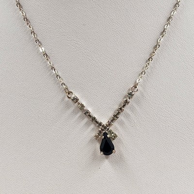 Silver tone necklace with rhinestones and black onyx teardrop pendant