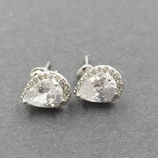 Silver tone pear cut halo stud earrings with clear rhinestones