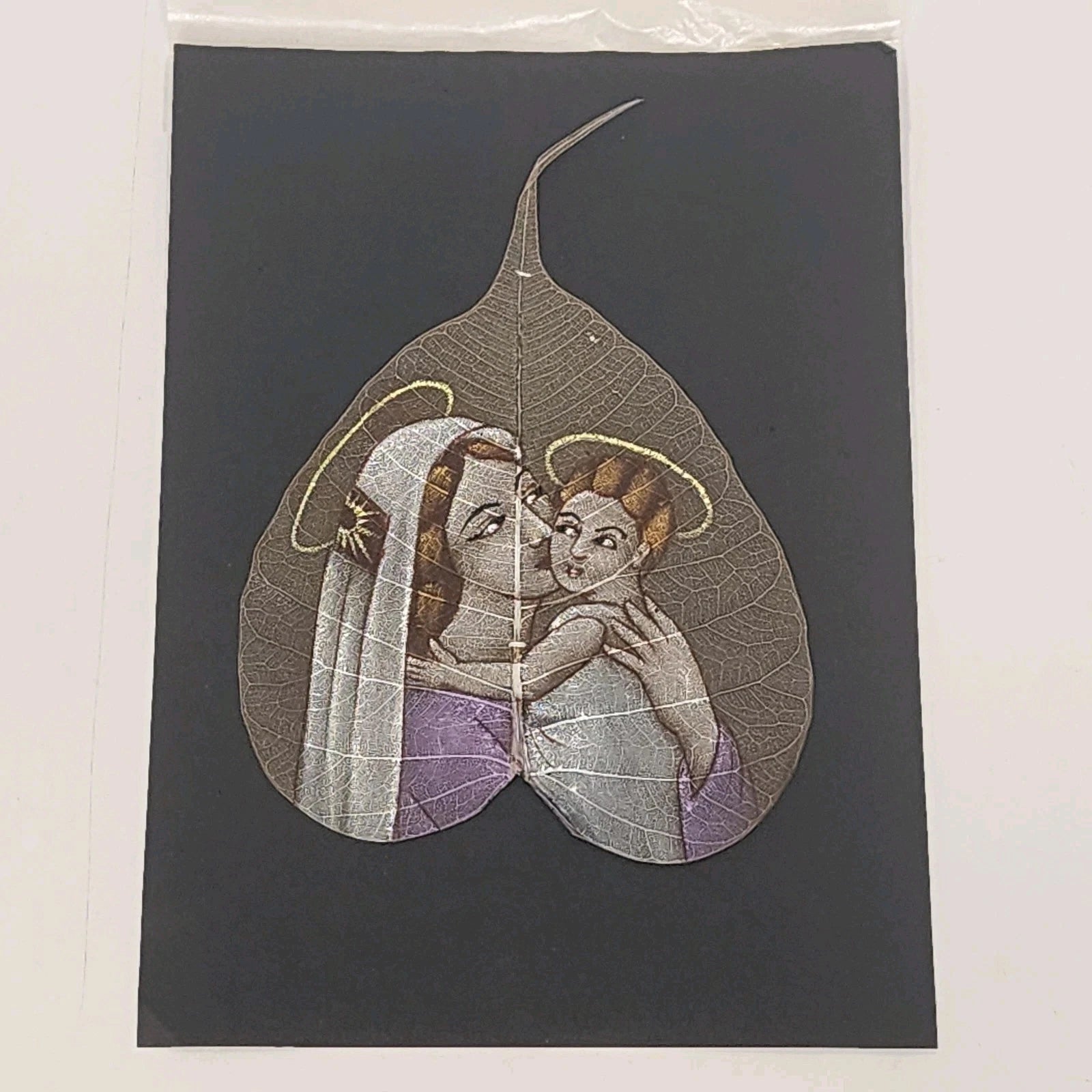South Indian hand painted Madonna and Child artwork on a Peepal skeleton leaf