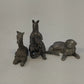 Three pewter animal figurines kangaroo giraffe and reclining dog