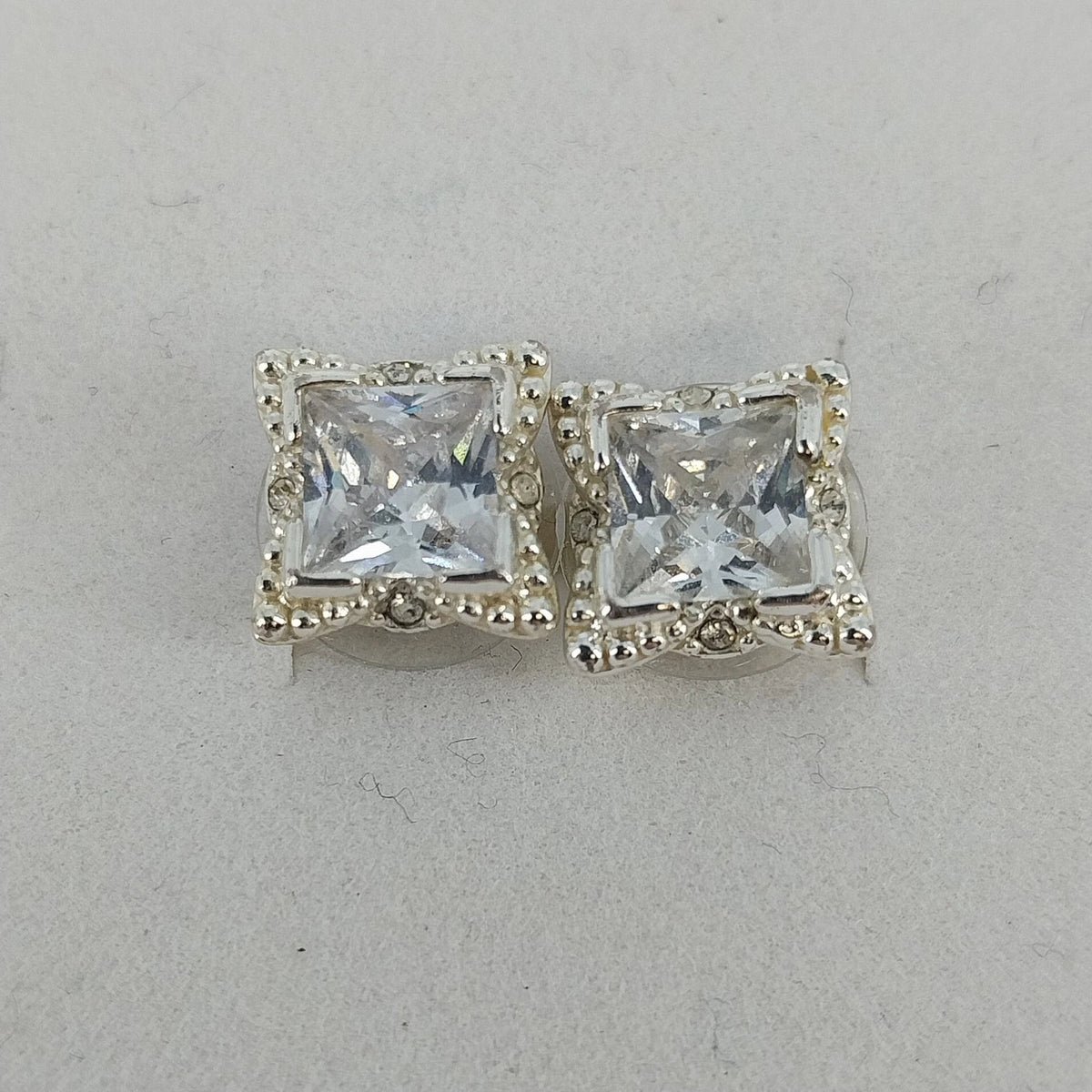 Silver tone square crystal halo stud earrings