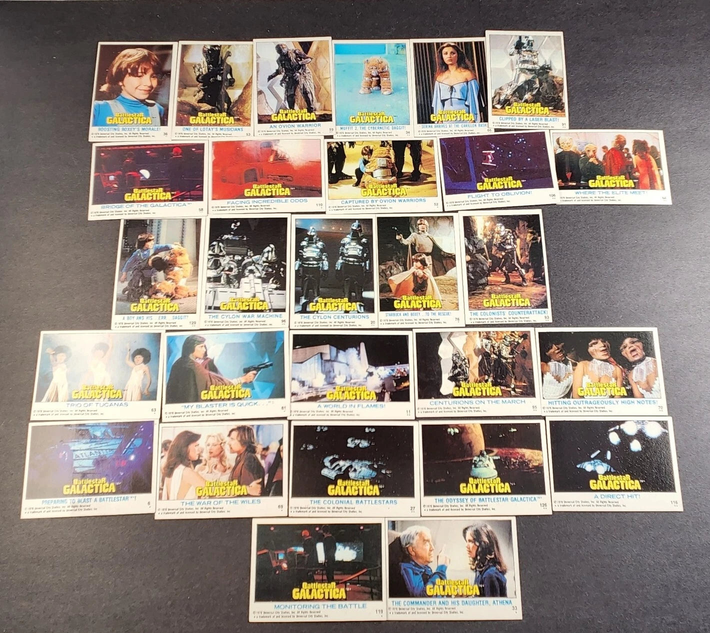 Collection of vintage 'Star Trek' trading cards on a dark surface