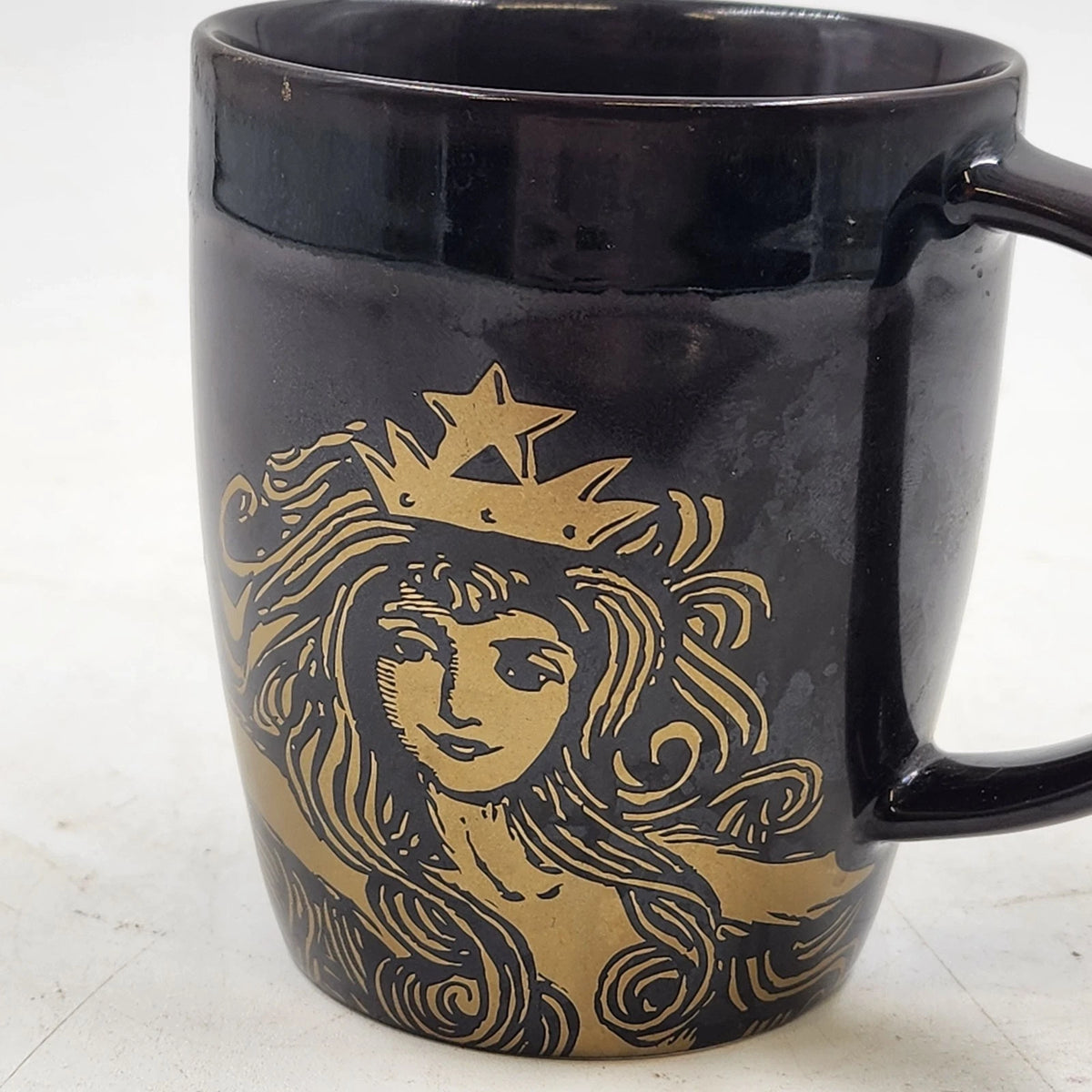 Starbucks 2012 anniversary mug with siren mermaid logo brown copper finish