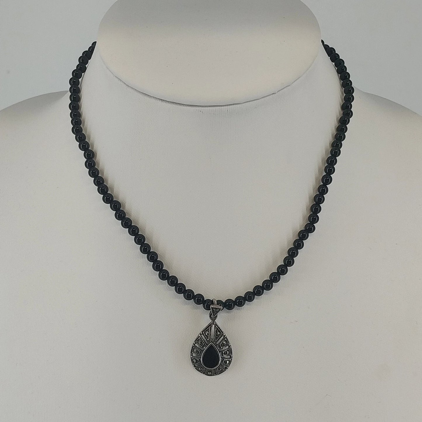 Vintage sterling silver necklace with black onyx teardrop pendant
