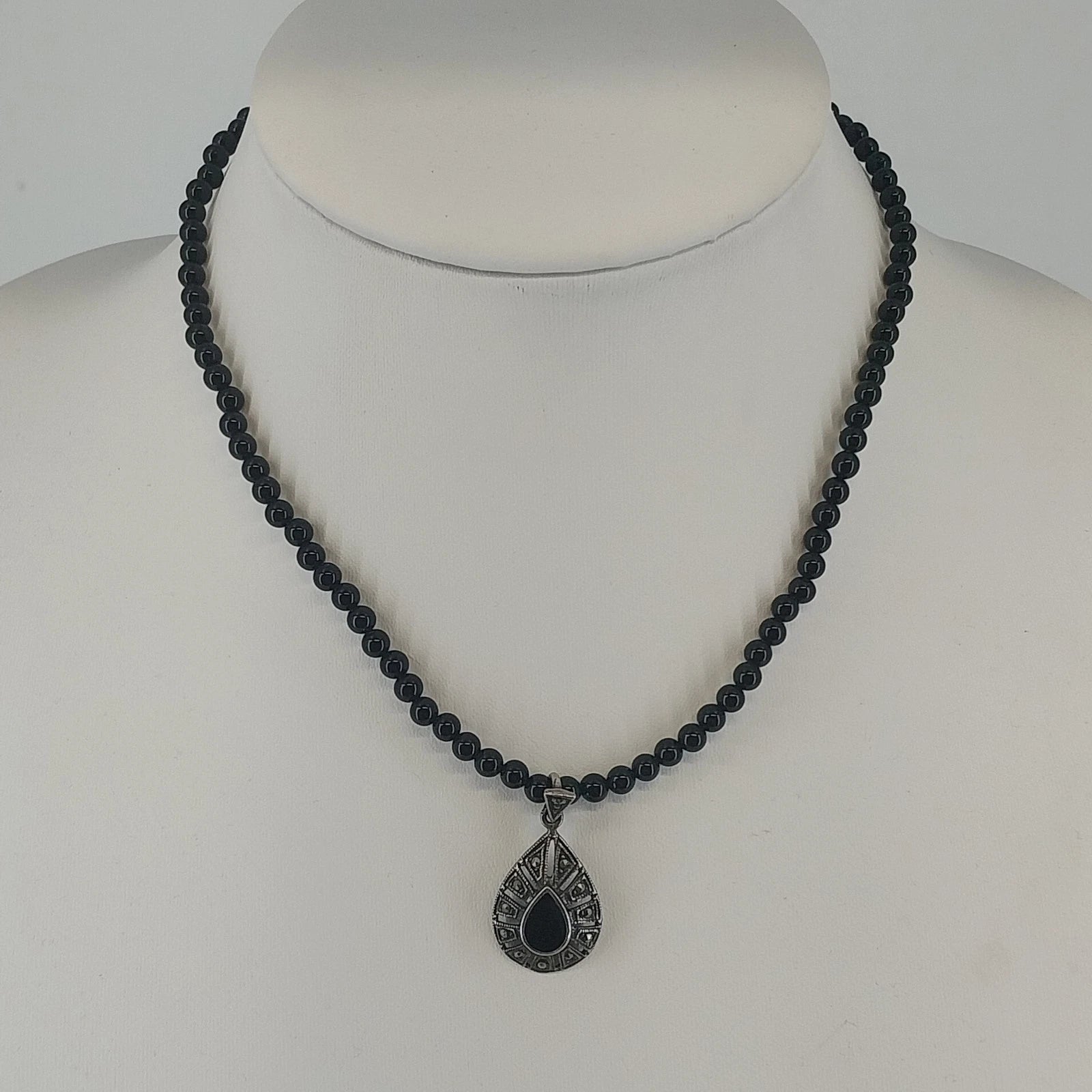 Vintage sterling silver necklace with black onyx teardrop pendant