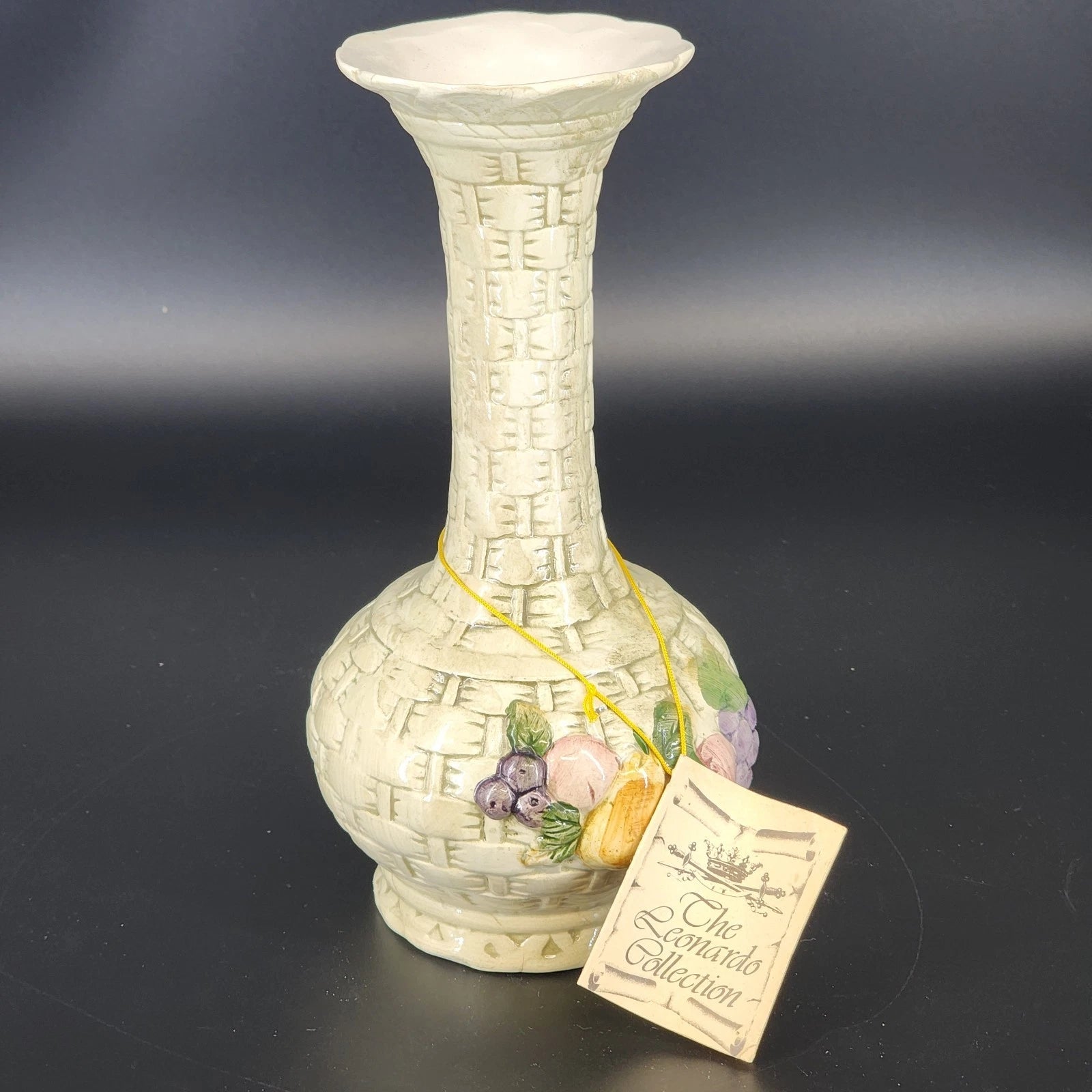 The Leonardo Collection ceramic vase with basketweave texture and fruit relief design