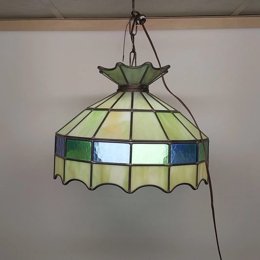 Green Tiffany style stained glass hanging light with white globe diffuser