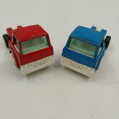 Lot of two vintage Tootsietoy COE diecast truck cabs red blue