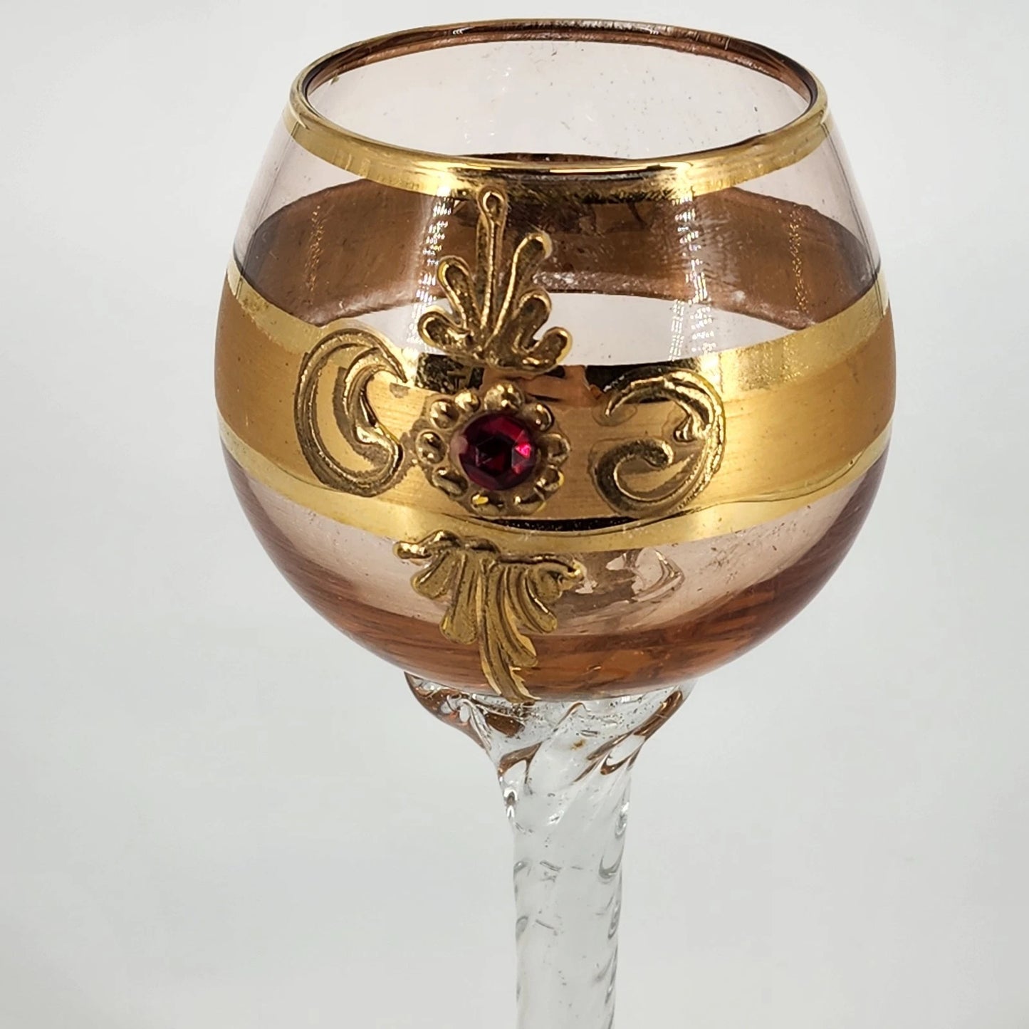 Hand blown Tre Fuochi style wine goblet with ruby red glass gold enamel and twisted stem