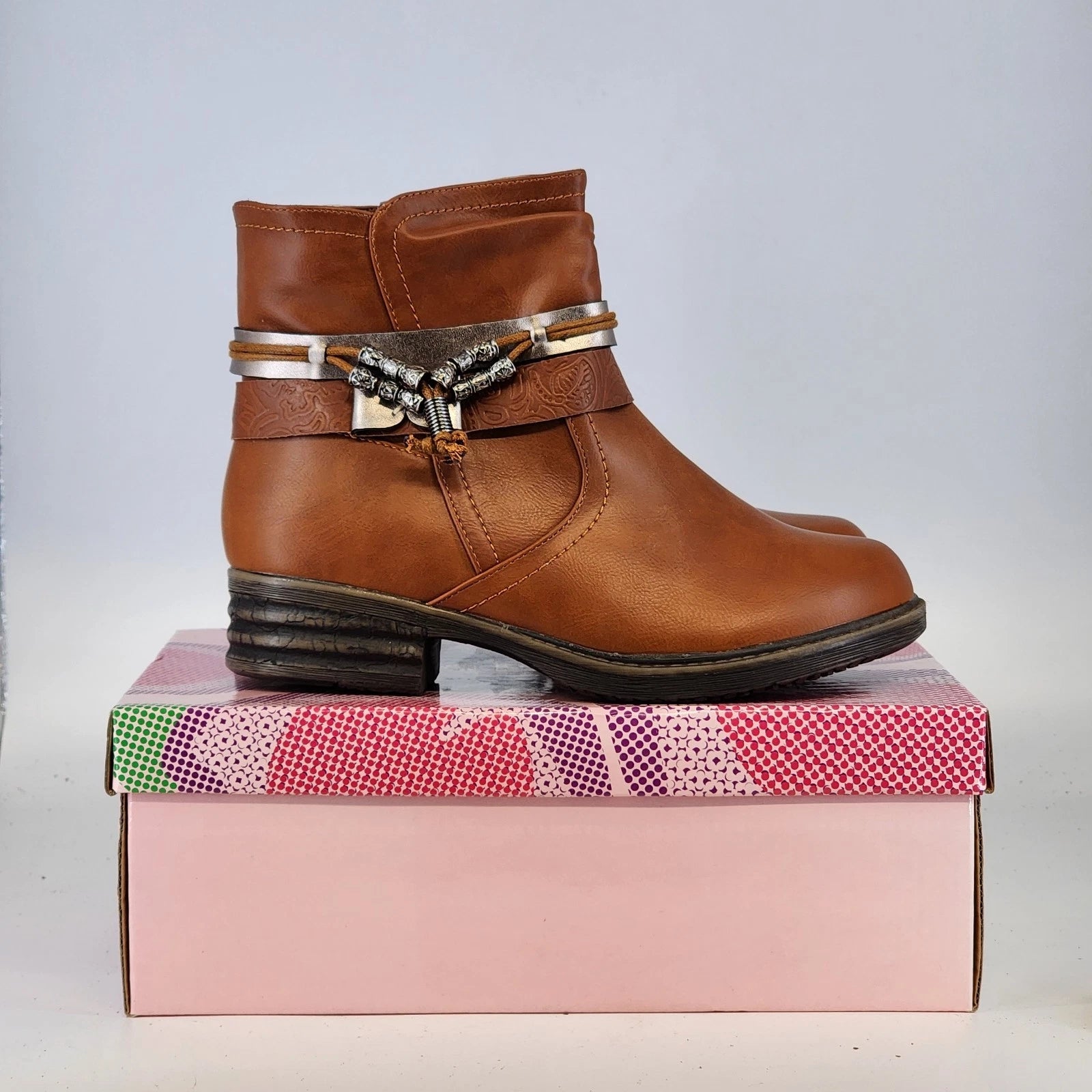 Via Pinky Elly-02 camel ankle boots with tassel and metal strap accents