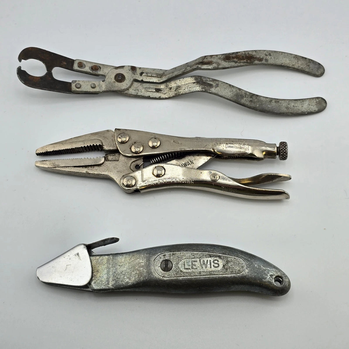Vintage lot of three hand tools with locking pliers and utility knife