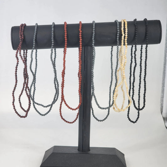 Vintage 6 strand seed bead necklace with glass stone and metal beads