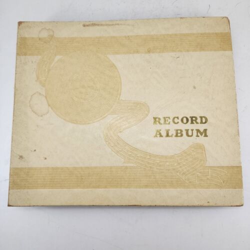 Vintage 78 RPM shellac records in worn album featuring various artists