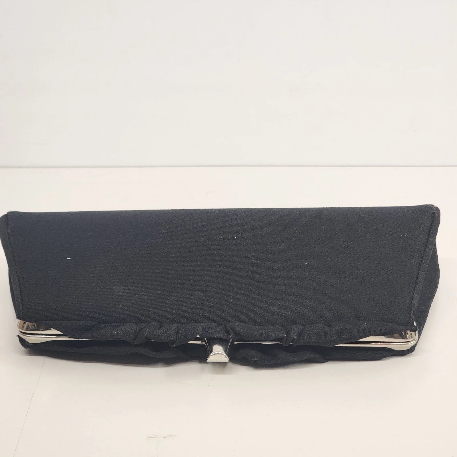 Vintage black evening clutch bag with canvas exterior and leather interior