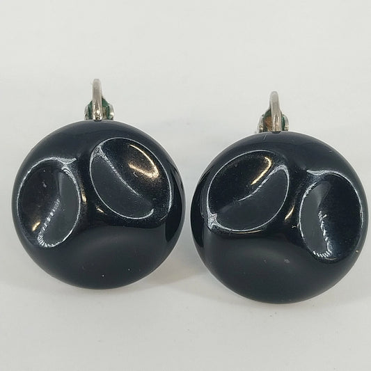 Glossy black round dome clip-on earrings with abstract recessed design