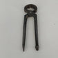Vintage forged steel blacksmith nippers with ball claw handles