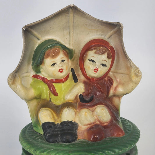 Vintage Hummel style boy girl umbrella rotating music box figurine