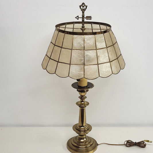 Vintage brass table lamp with natural Capiz shell shade, twin pull chains, and weathervane-style finial