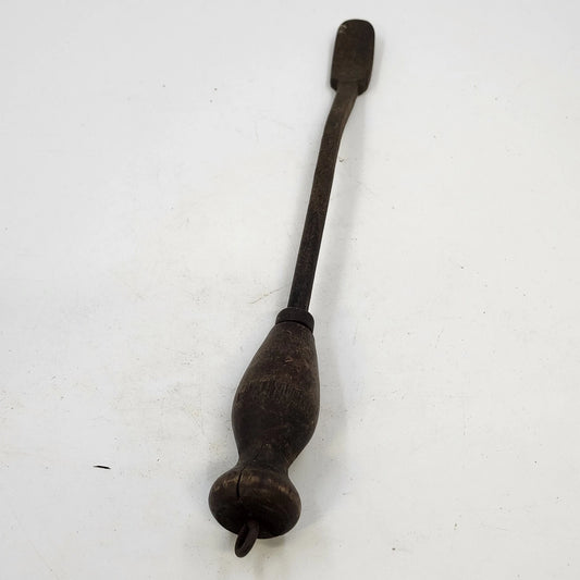 Vintage cobbler glazing iron with grooved metal head and wood handle