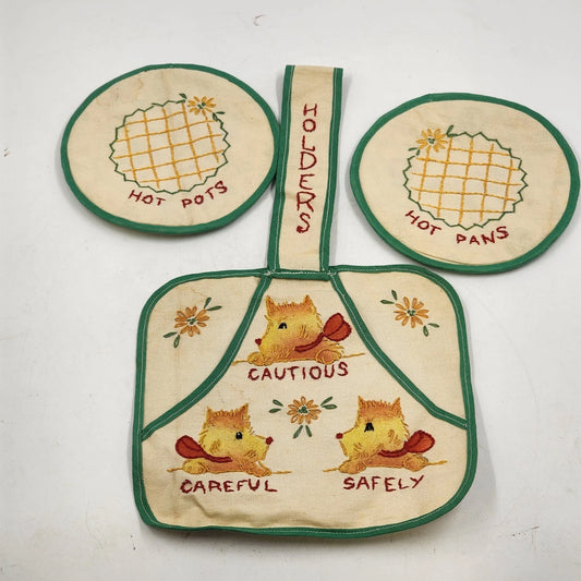 Vintage embroidered yellow and green pot holder set