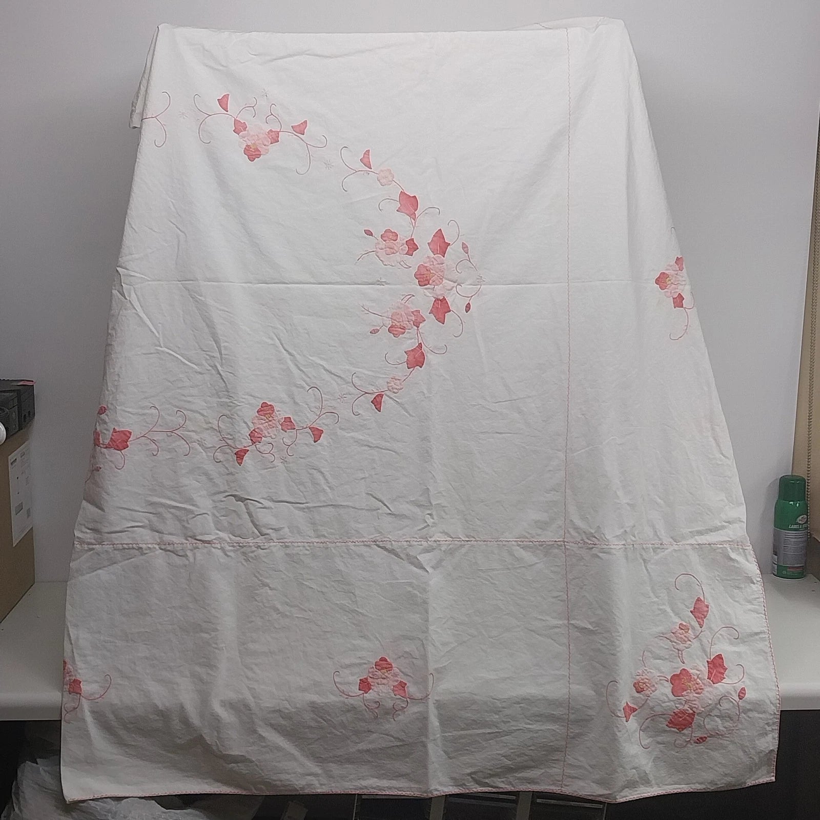 White vintage tablecloth with pink floral applique embroidery