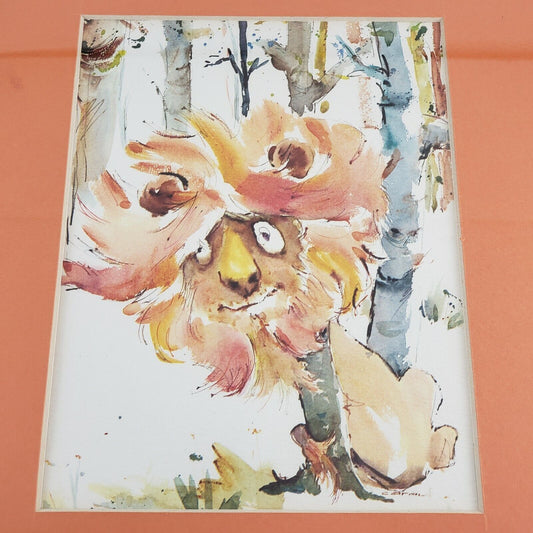 Vintage framed watercolor lion print with orange mat and wood frame under glass
