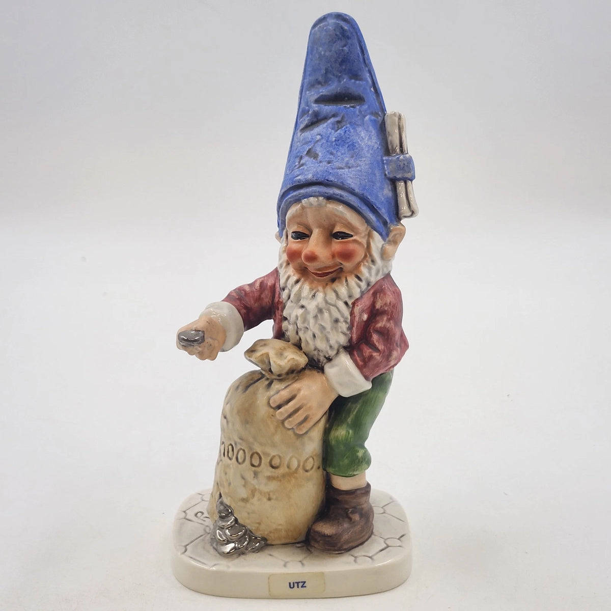 Vintage 8-inch Goebel Utz Banker gnome figurine with money sack