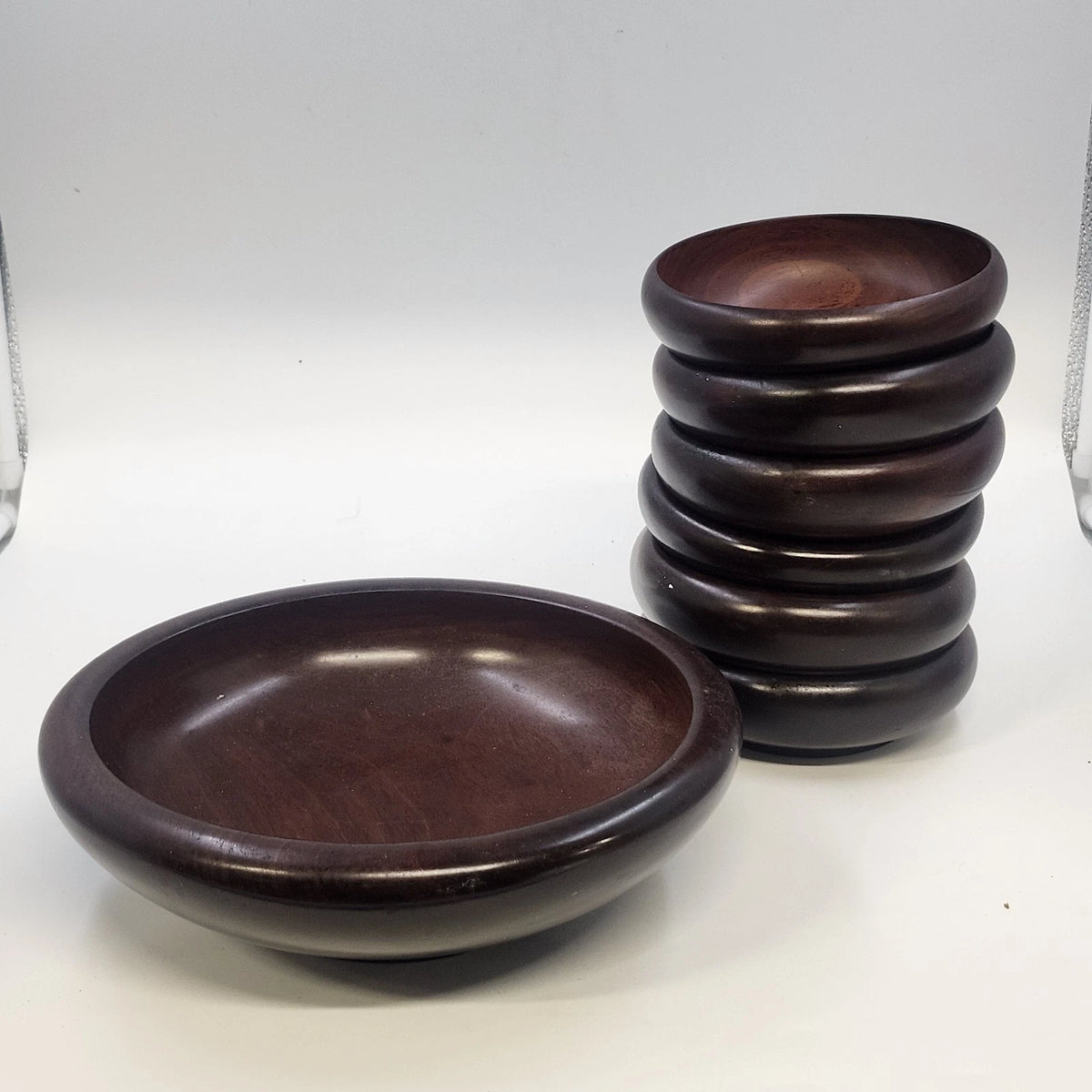 Vintage 1970s Haitian wooden salad bowl set with seven nested bowls