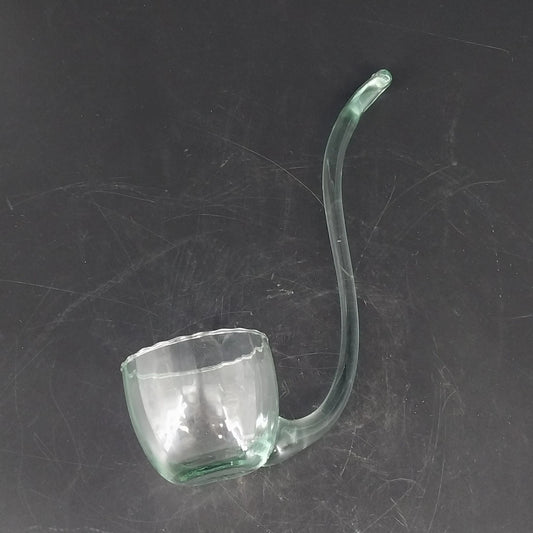 Vintage hand blown glass punch bowl ladle with green tint and curved handle