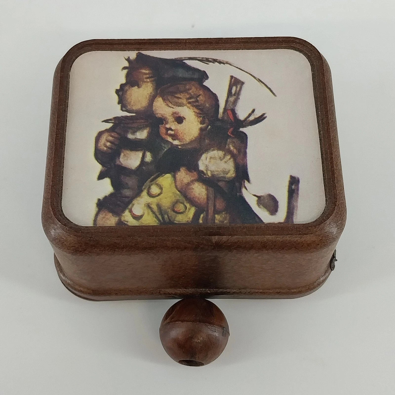 Vintage Hummel print pull string music box made in Japan with wood tone finish