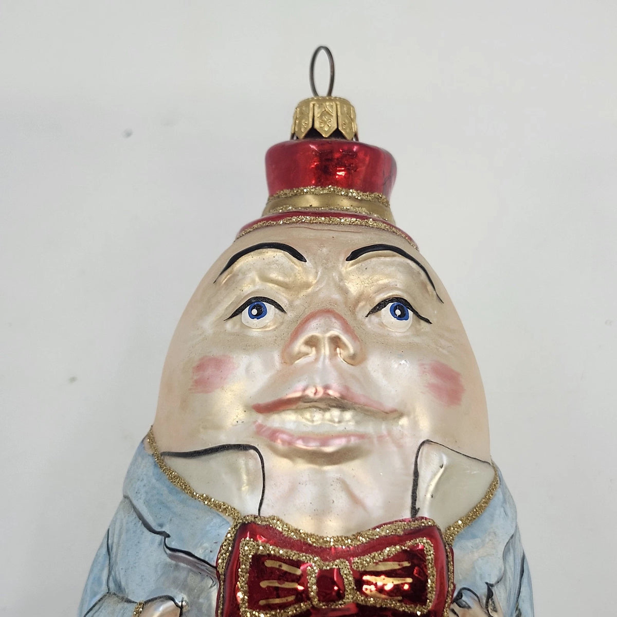 Vintage hand-painted Humpty Dumpty blown glass Christmas ornament with colorful metallic clothing