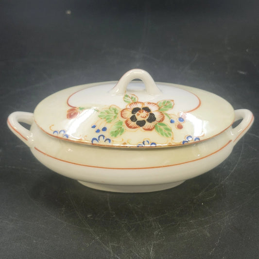Vintage Japan porcelain covered serving bowl with floral design and double handles