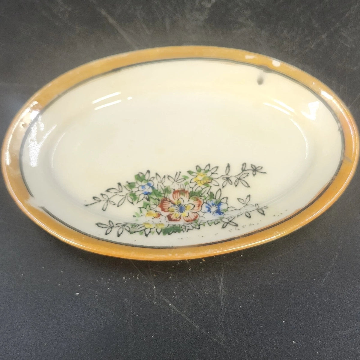 Vintage Japan porcelain oval serving dish with floral bouquet and orange trim