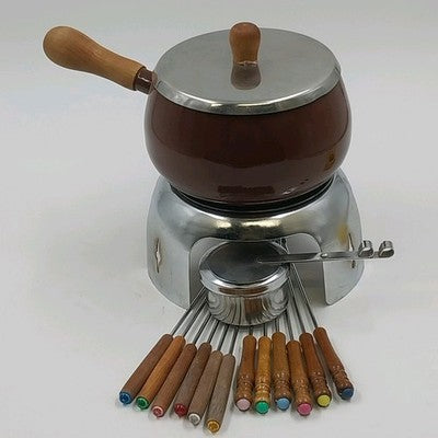 Vintage brown enamel fondue pot set with wood handles and metal stand
