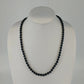 Signed Monet black faceted bead necklace with hook clasp 24 inches