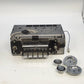 Vintage Oldsmobile Delco AM car radio with chrome buttons and knobs