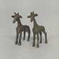 Pair of vintage pewter giraffe miniature figurines