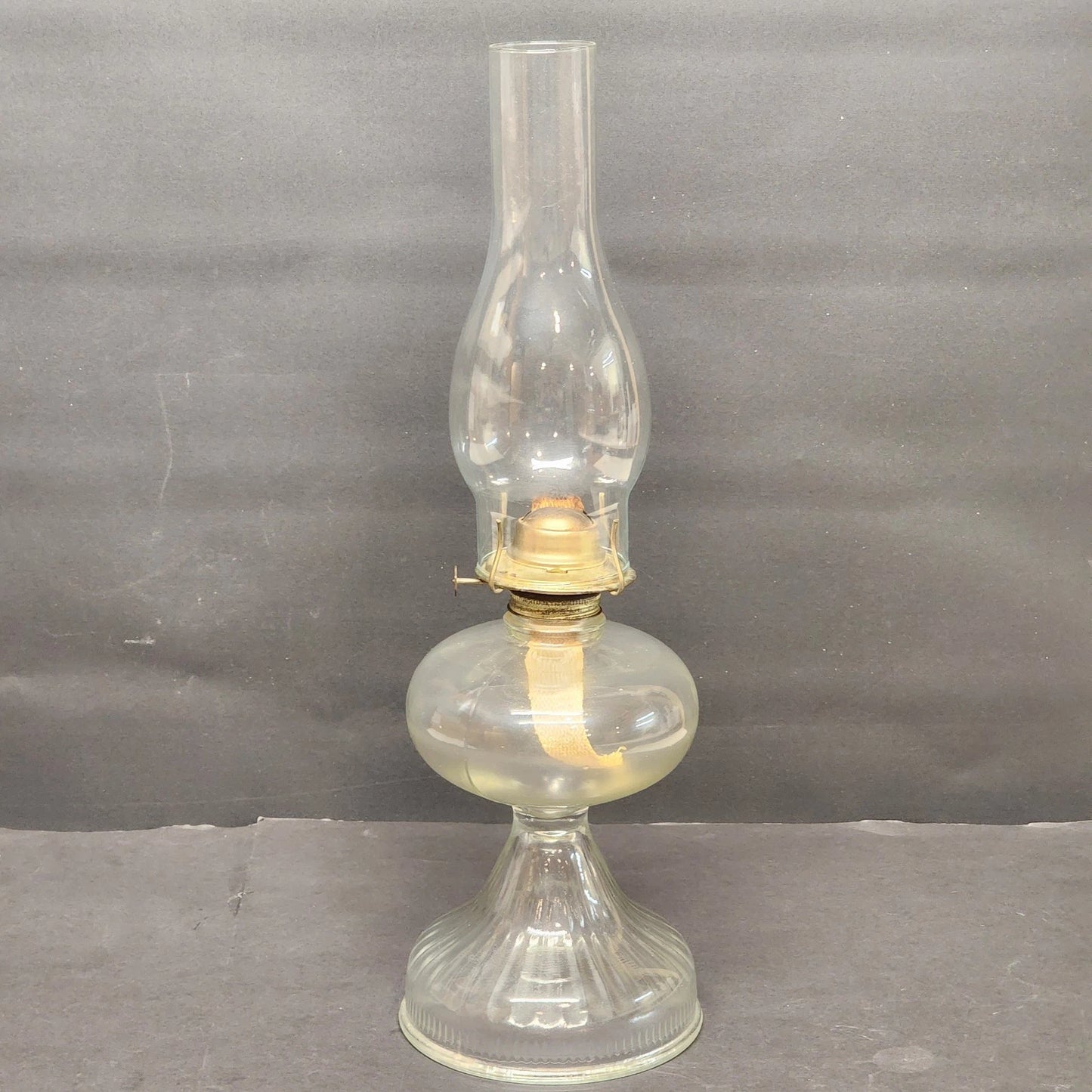 Vintage clear glass kerosene oil lamp with chimney