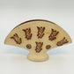 Vintage beige pottery napkin holder with brown flying dog motif