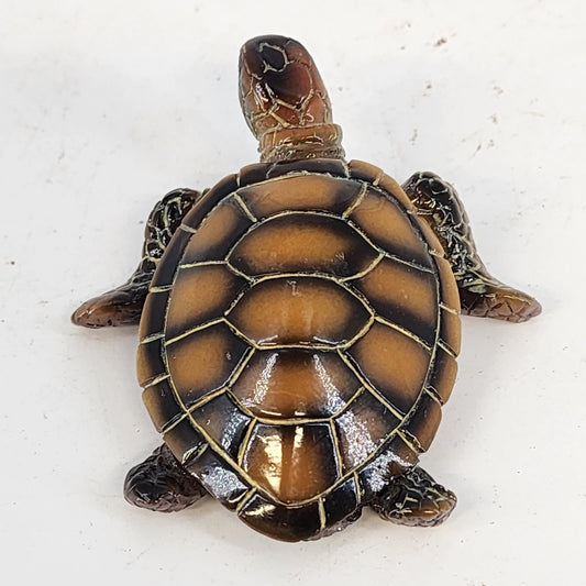 Small brown resin tortoise figurine with realistic shell details