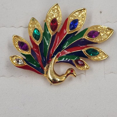 Gold tone peacock brooch with multicolor rhinestones and enamel