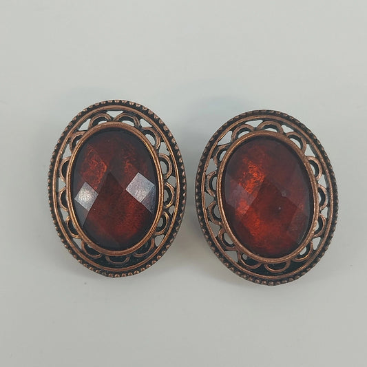 Vintage clip on earrings with root beer faceted stones and rhinestones