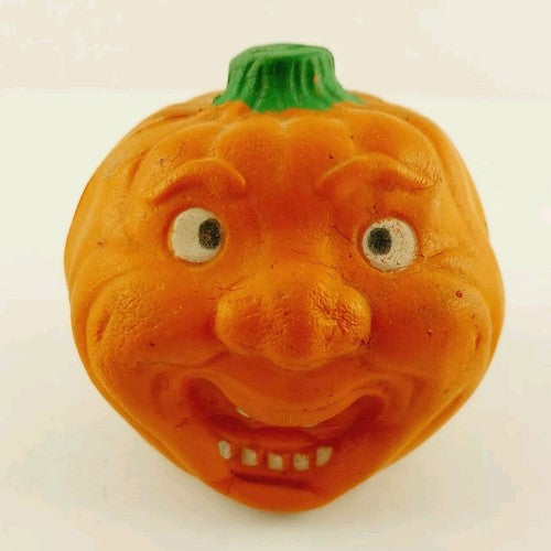 Vintage Russ squishy pumpkin with crazy jack-o-lantern face