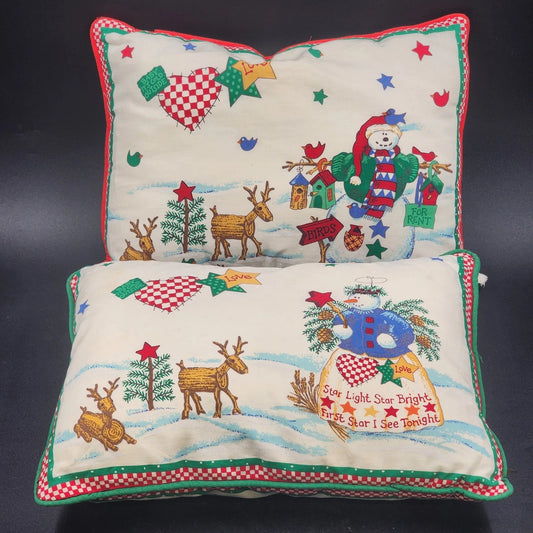 Set of two vintage Christmas snowman throw pillows with stars and birds