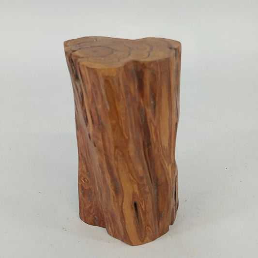 Vintage solid wood stump with natural wood grain and varnished finish