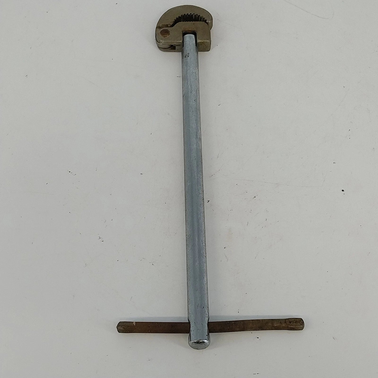 Vintage steel basin wrench with adjustable spring loaded jaw