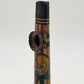 Vintage metal tin kazoo with colorful comic animal characters