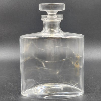 Waterford clear glass oval liquor decanter with stopper, 9 inches tall